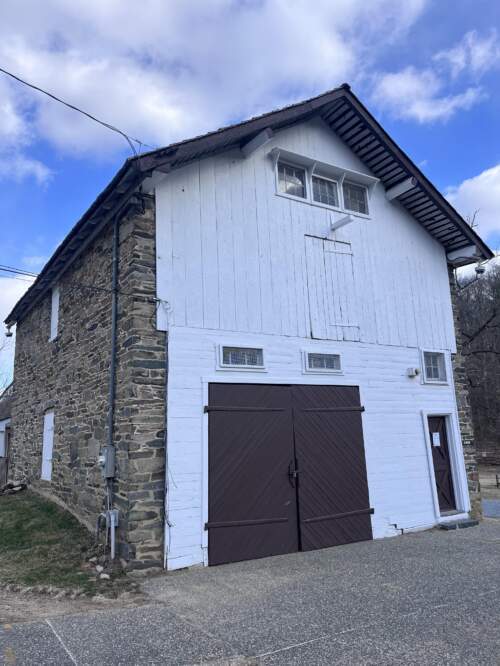 White and stone barn